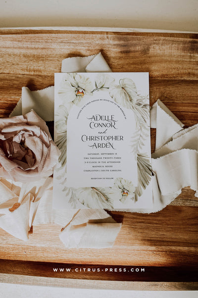 Boho Tropical Arch Wedding Invitation with Orchids and Anthurium and Pampas Grass and dried palms